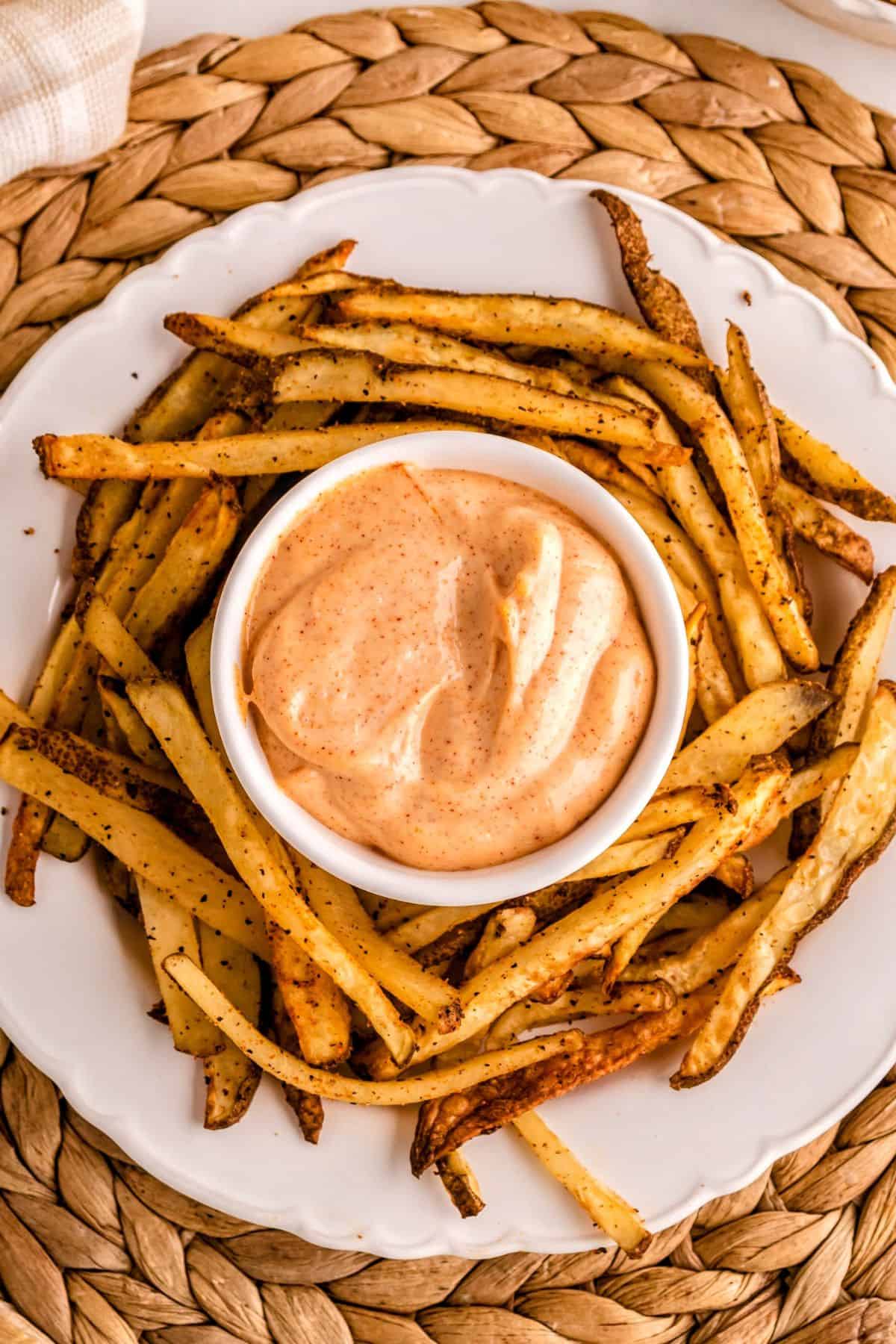 Homemade French fries in the air fryer oven with fluffy potato centers