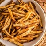 Homemade French fries in the air fryer oven cooked until crisp and golden