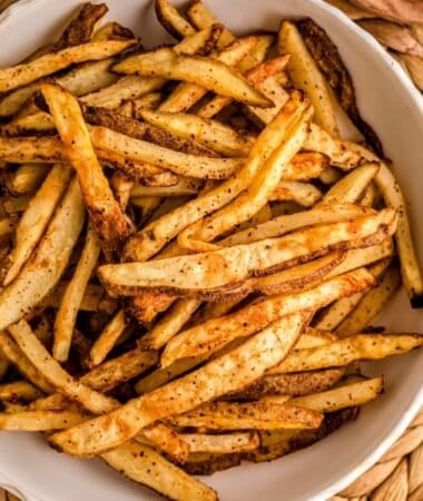 Homemade French fries in the air fryer oven cooked until crisp and golden