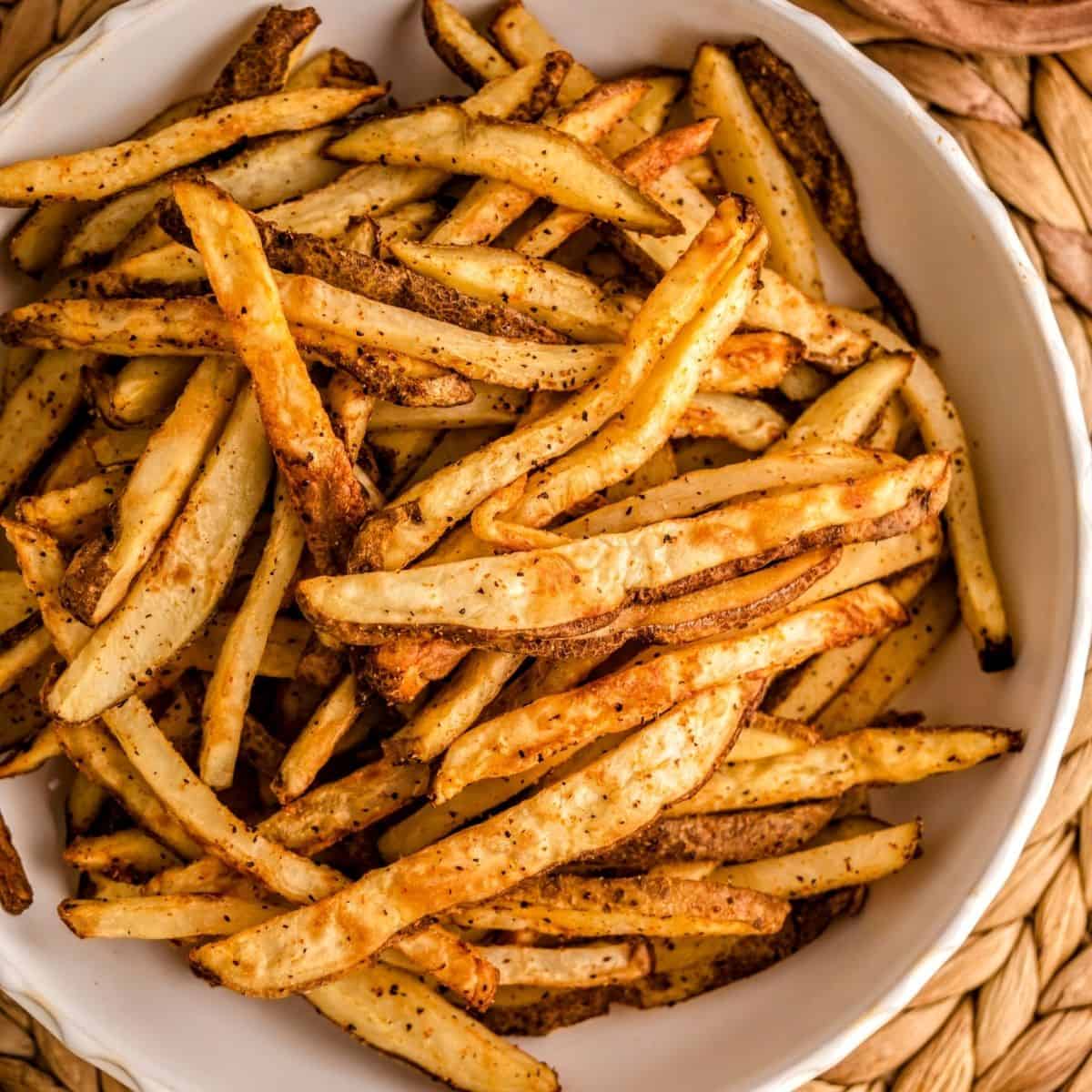 Homemade French fries in the air fryer oven cooked until crisp and golden