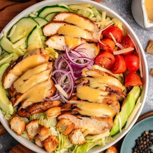 Fresh honey mustard chicken salad with creamy dressing and vegetables