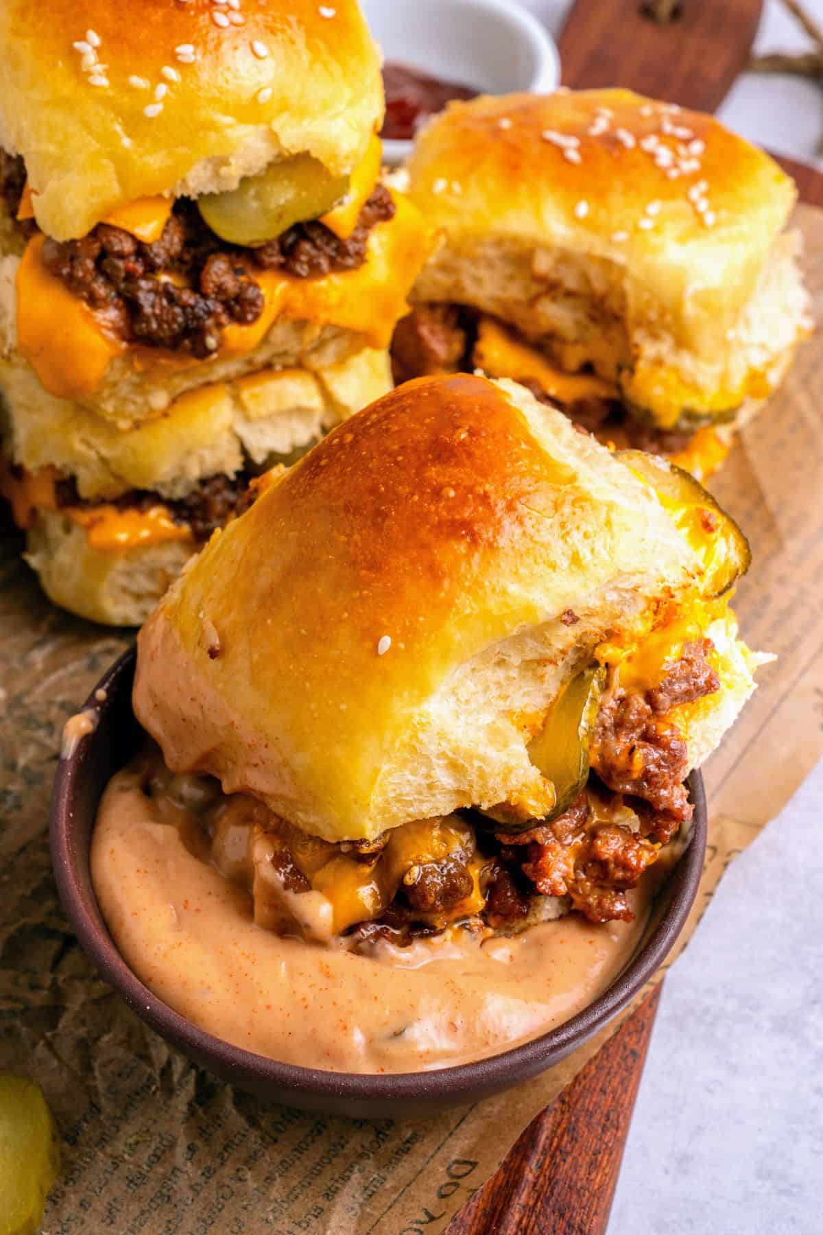 baked cheeseburger sliders fresh from the oven with golden buttery tops