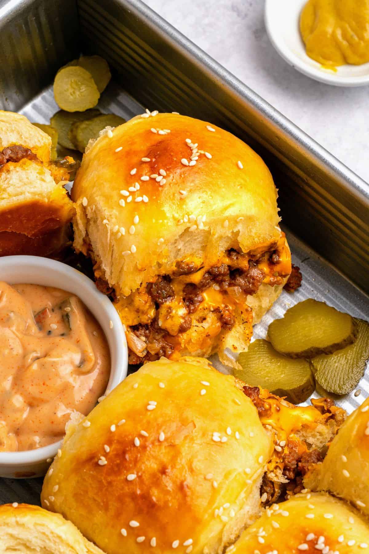 Cheeseburger sliders recipe with juicy seasoned ground beef and melted cheese