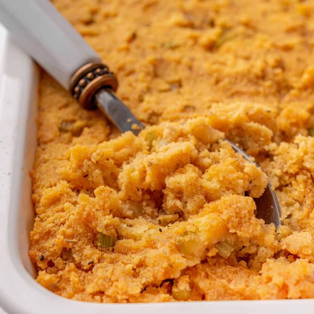 Cornbread dressing recipe with buttery sautéed vegetables and herbs