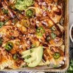 Shredded BBQ chicken nachos with melted cheese and BBQ sauce drizzle ready for game day