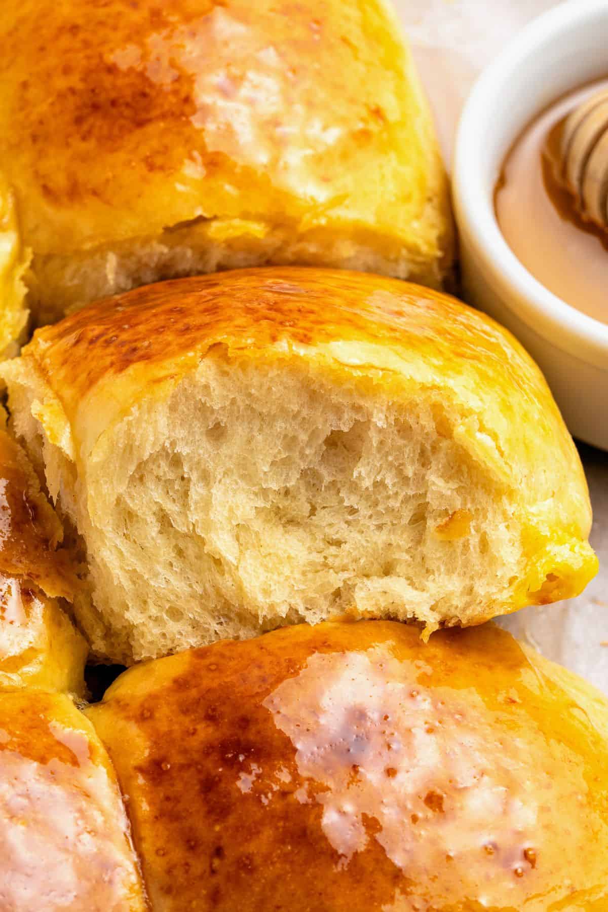 Homemade Hawaiian dinner rolls arranged on a baking pan