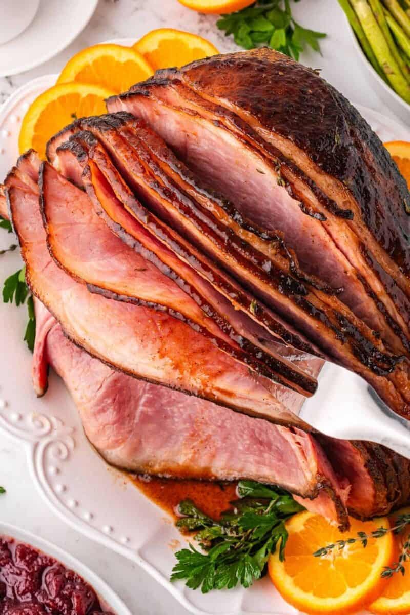 Honey glazed spiral ham with a shiny caramelized exterior