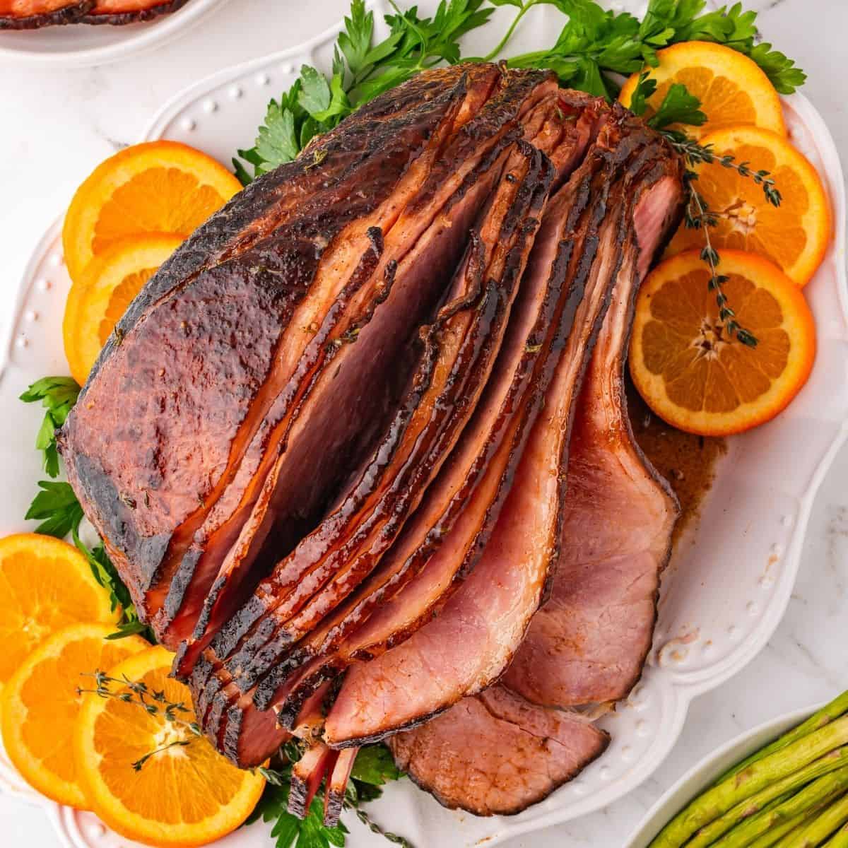 Brown sugar glazed spiral ham roasted until golden and caramelized