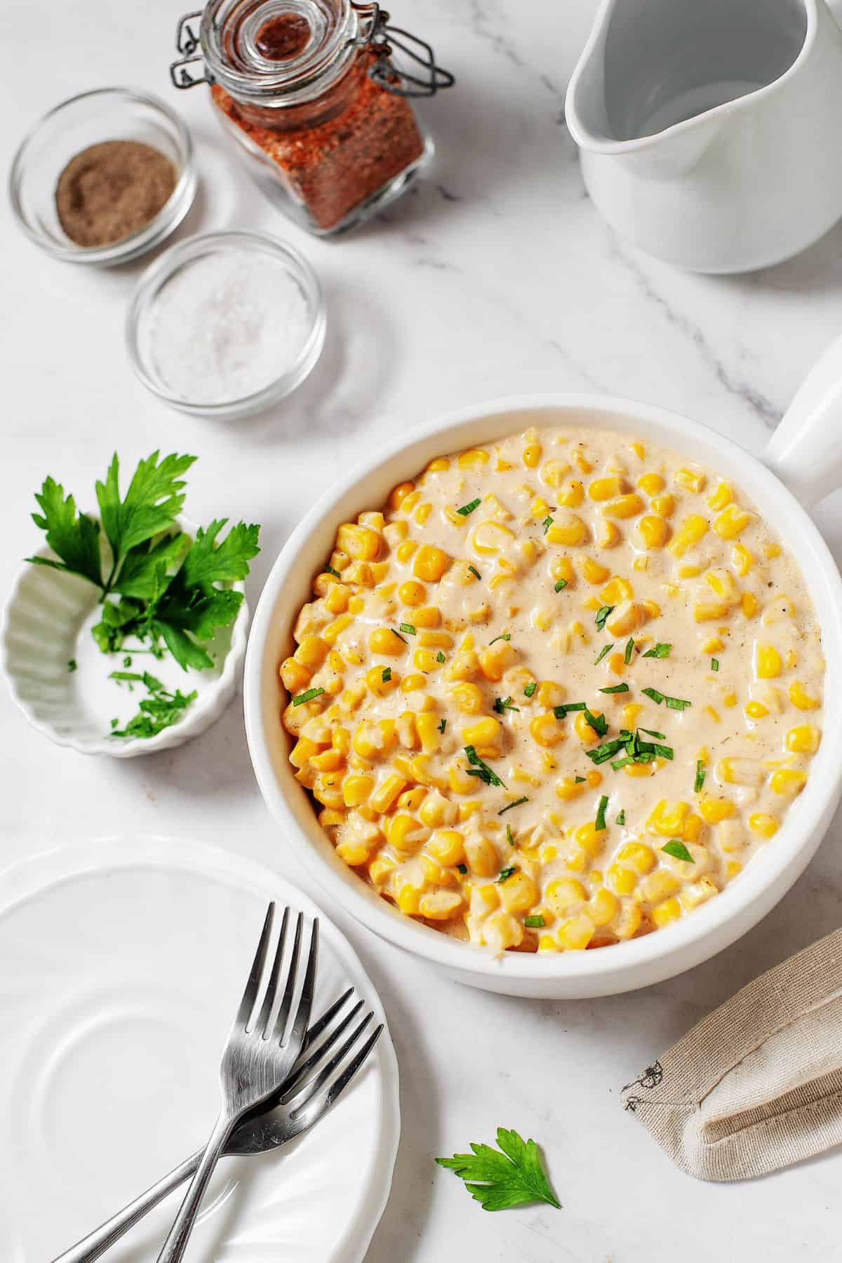 Recipe for creamed corn made with frozen corn and simple seasonings