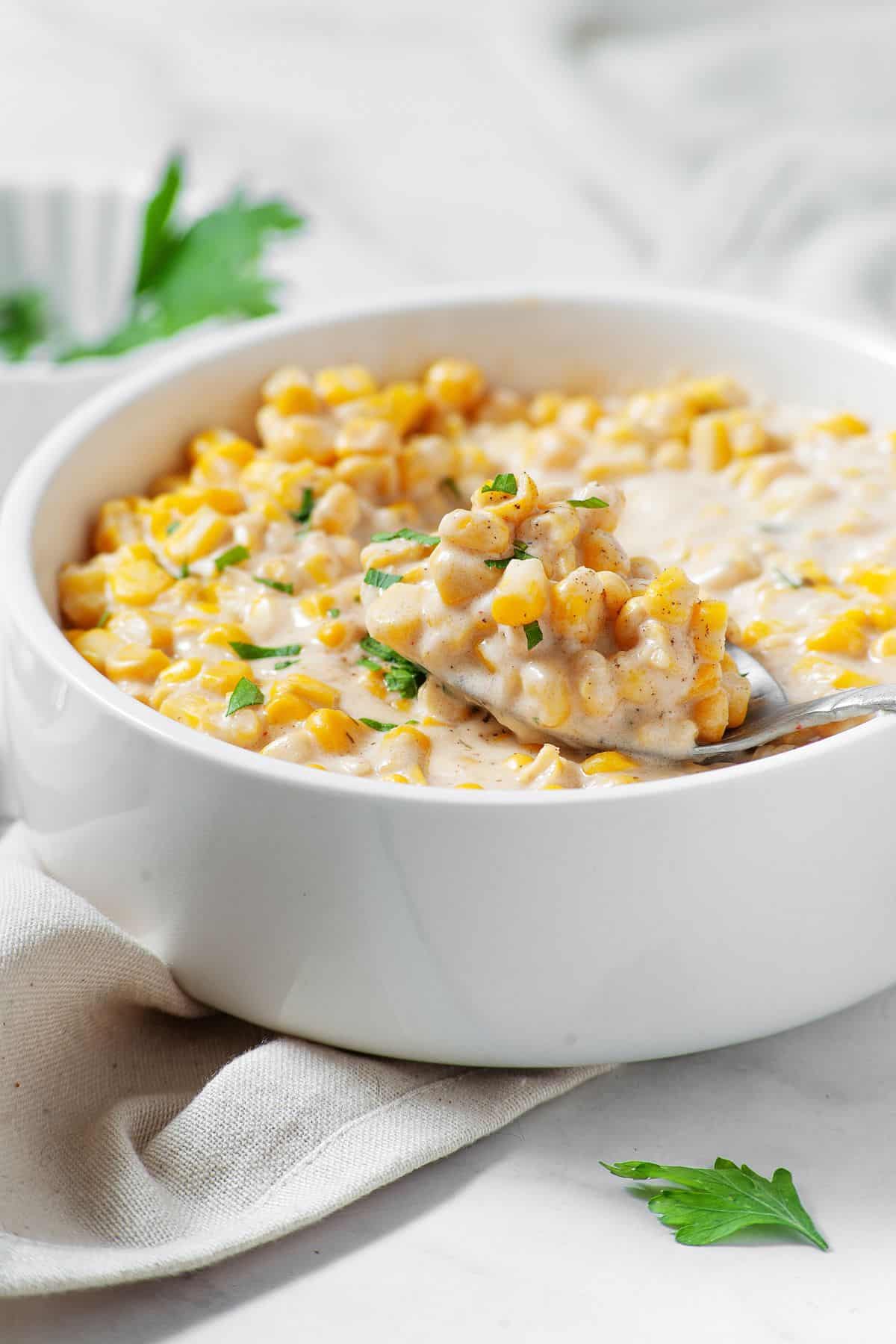 Creamed corn recipe with a smooth garlic Parmesan sauce
