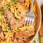 Beef and noodles crockpot recipe with tender chuck roast and egg noodles