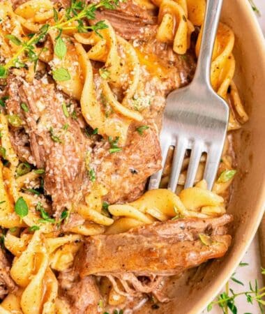 Beef and noodles crockpot recipe with tender chuck roast and egg noodles