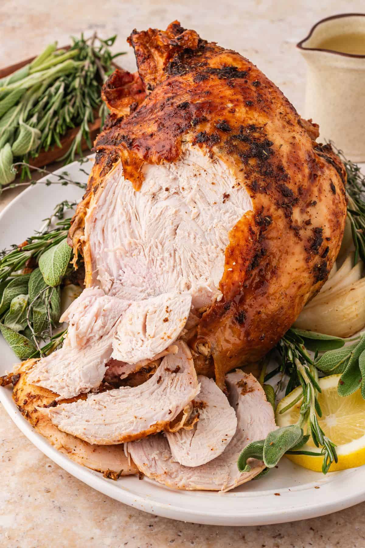 Bone in roast turkey breast served as a Thanksgiving holiday centerpiece