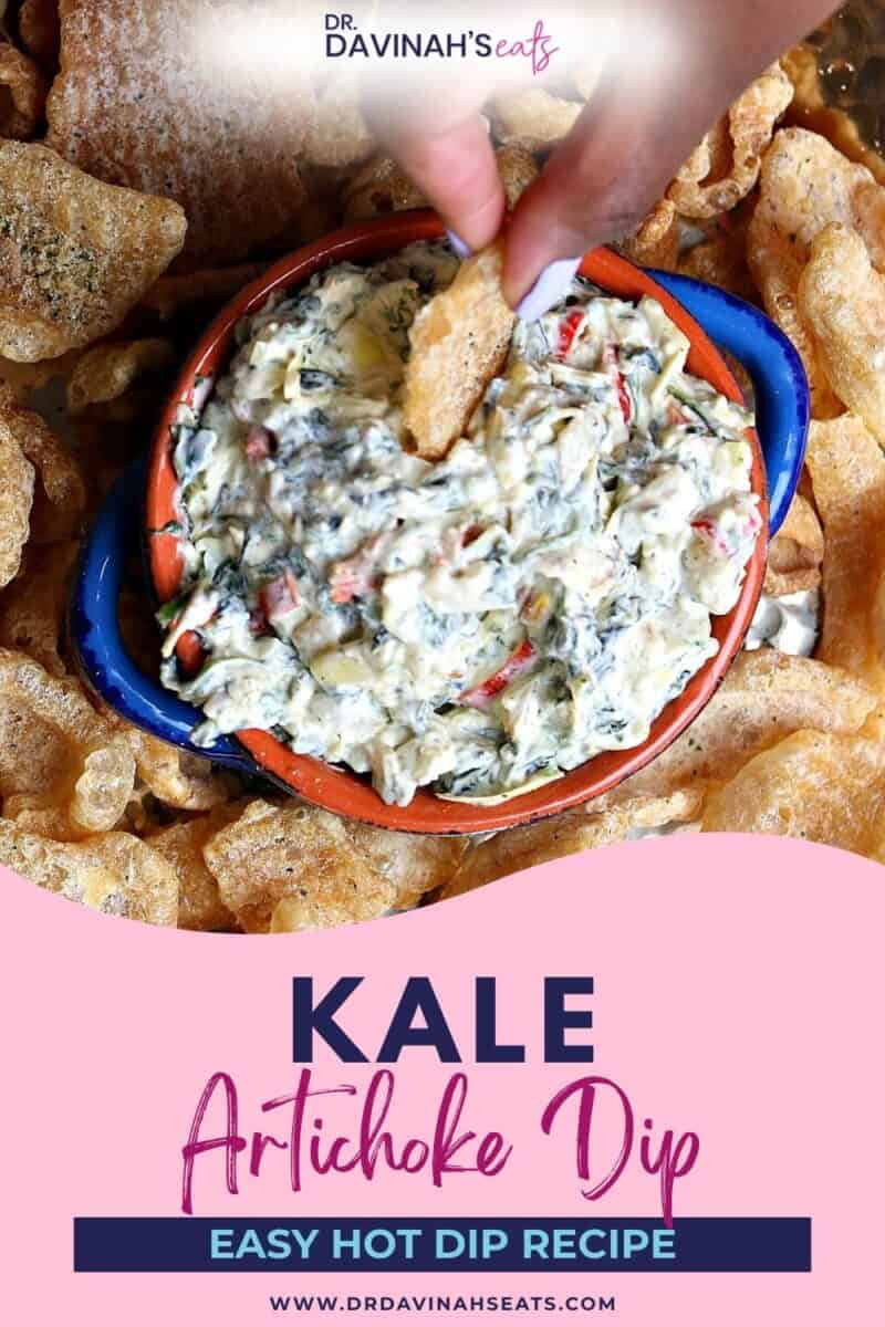 kale artichoke hot dip in a bowl on a serving platter