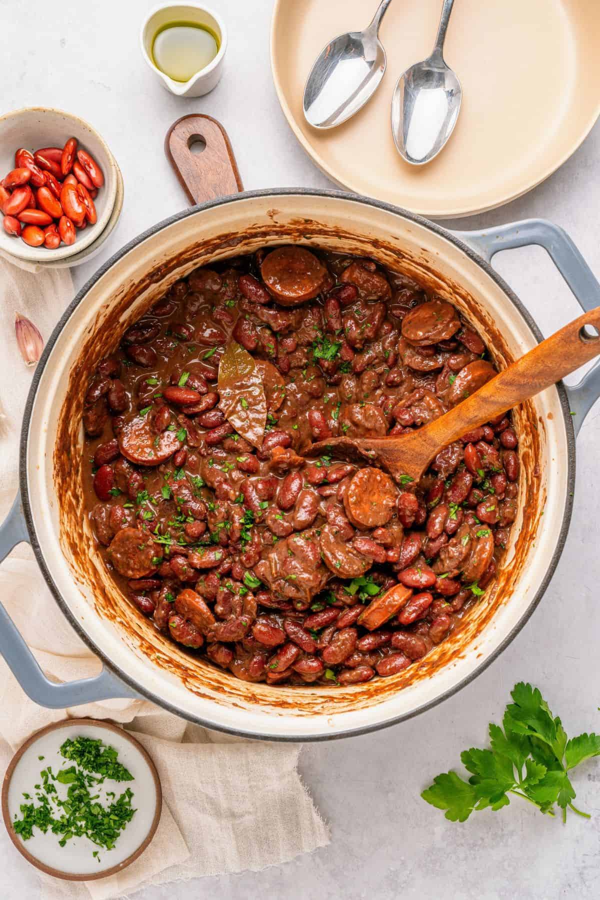 Red beans and rice with sausage simmered on the stovetop until tender