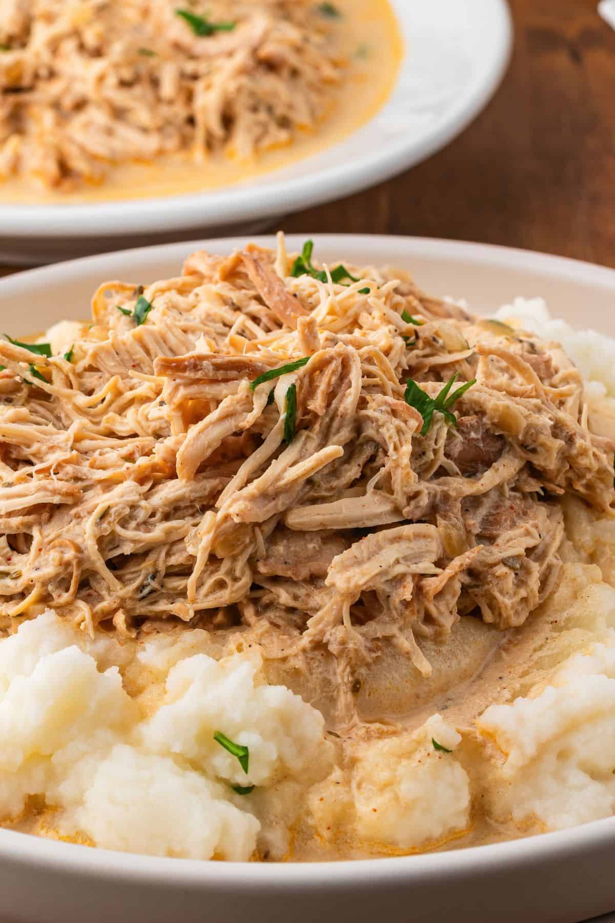 Crockpot chicken and gravy recipe finished with a creamy, savory sauce