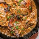 Smothered pork chops recipe with tender pork covered in homemade gravy