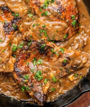 Smothered pork chops recipe with tender pork covered in homemade gravy