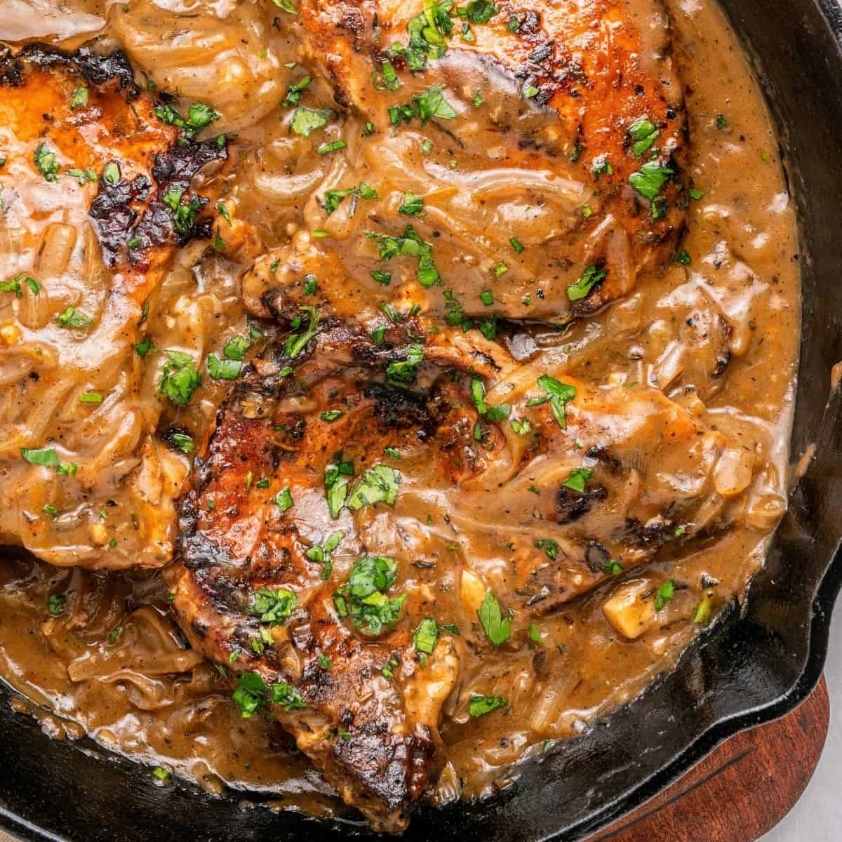 Smothered pork chops recipe with tender pork covered in homemade gravy