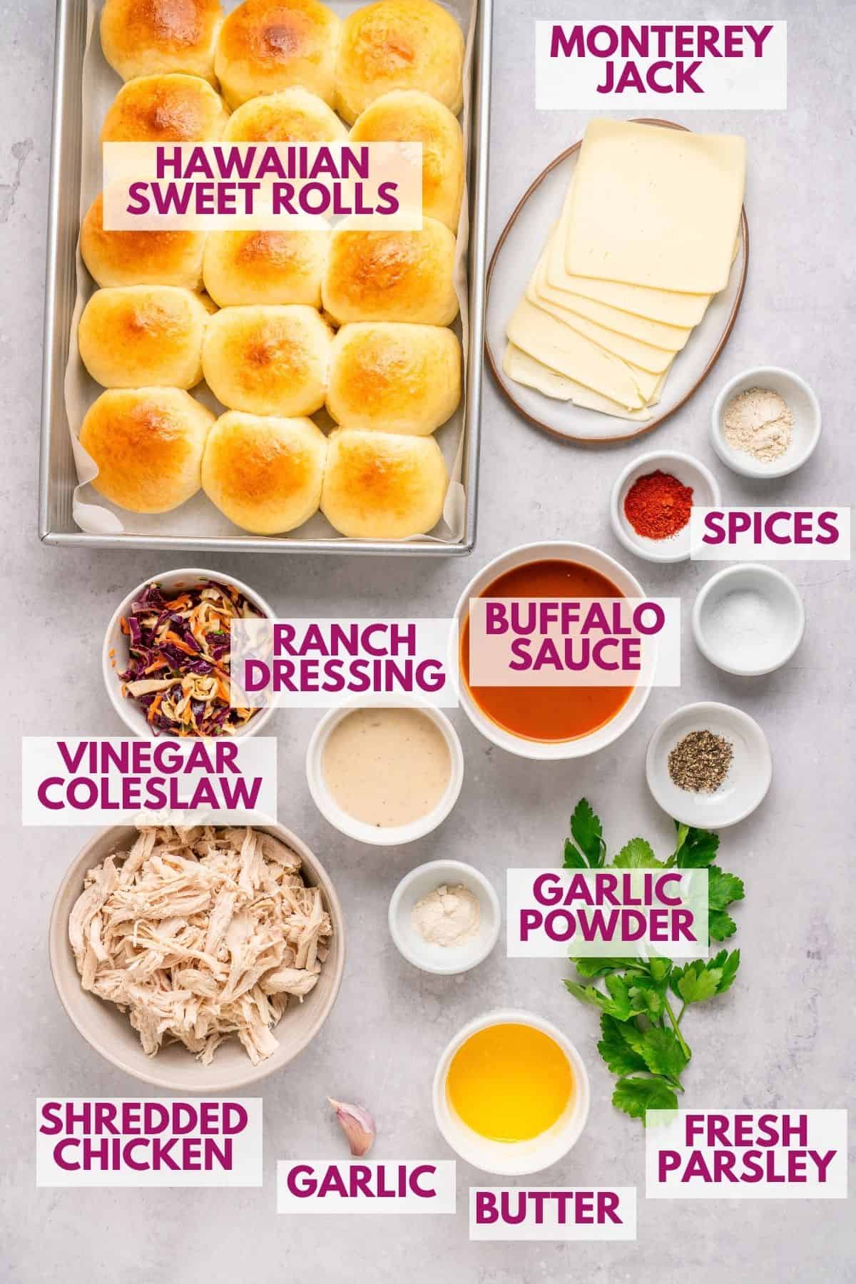 ingredients to make shredded chicken buffalo chicken sliders topped with a buttery garlic seasoning