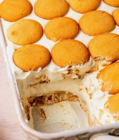 Southern banana pudding recipe layered with homemade pudding, fresh bananas, and vanilla cookies.