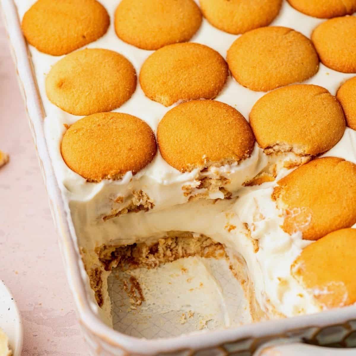 Southern banana pudding recipe layered with homemade pudding, fresh bananas, and vanilla cookies.