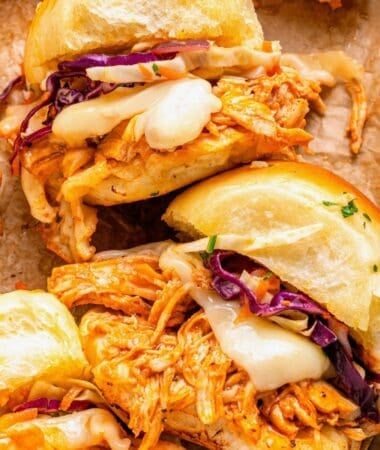 Hawaiian roll buffalo chicken sliders with a golden seasoned butter topping