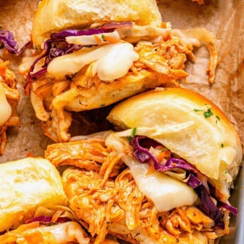 Hawaiian roll buffalo chicken sliders with a golden seasoned butter topping