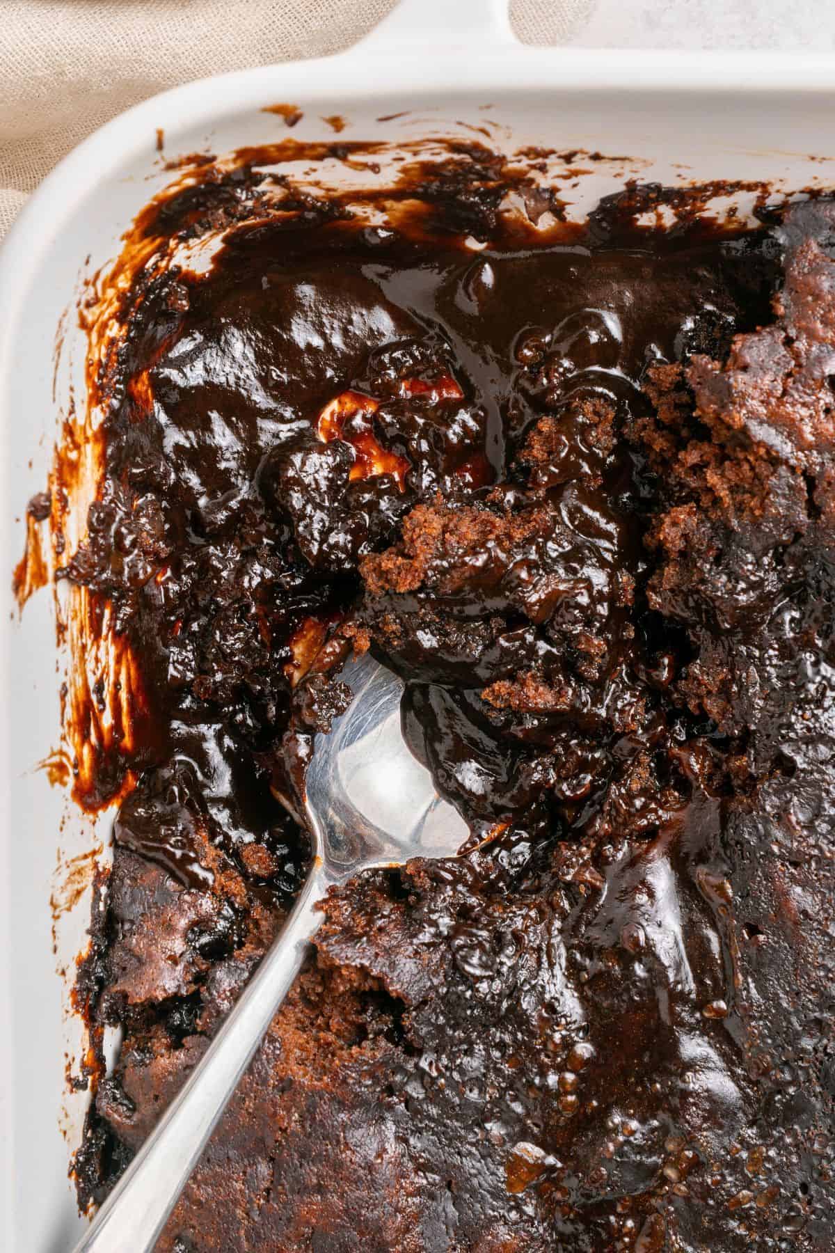 Hot fudge pudding cake served warm with rich chocolate sauce underneath