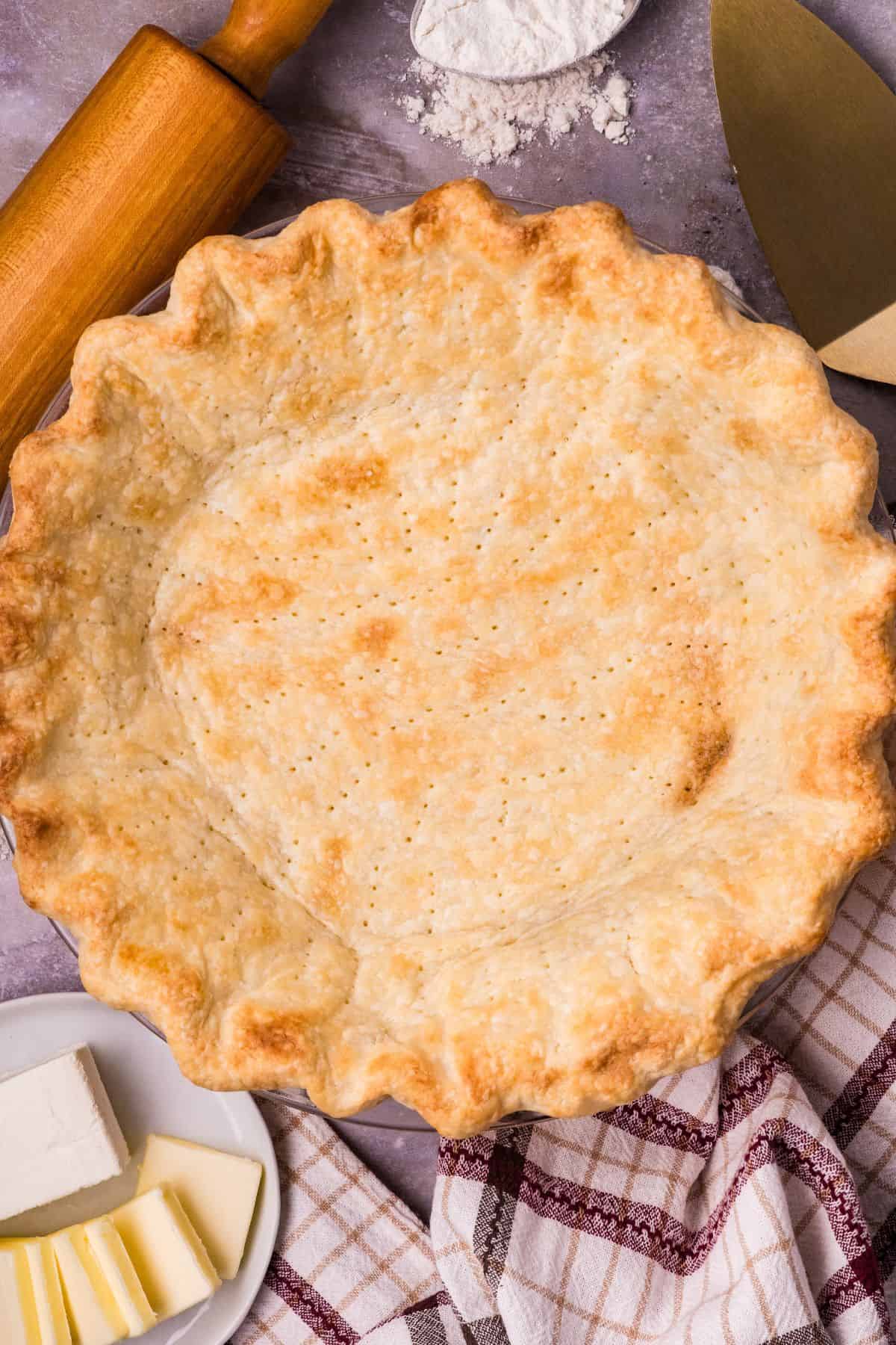 Pie crust recipe with cream cheese and butter for a tender, flaky homemade pastry after blind baking