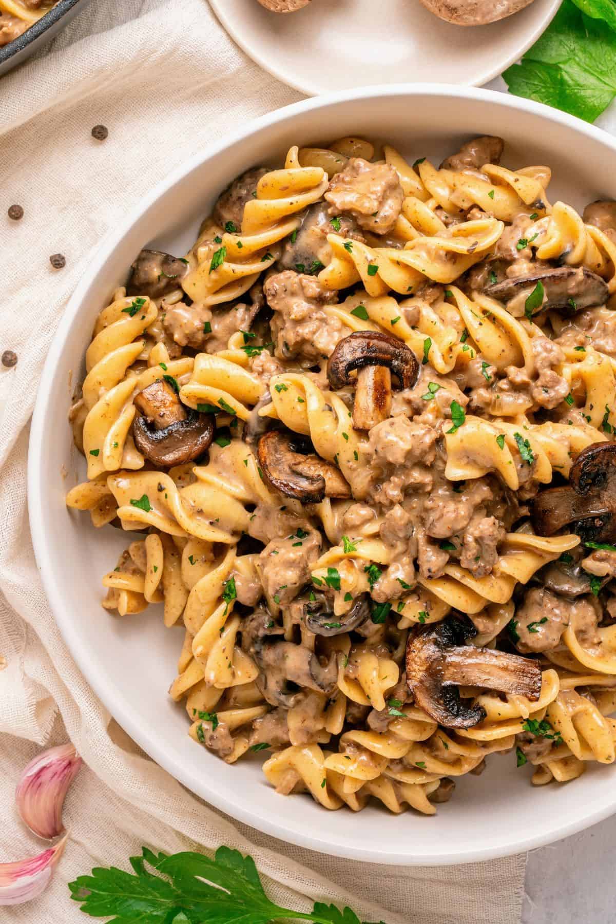 Ground beef stroganoff tossed with egg noodles and creamy mushroom sauce
