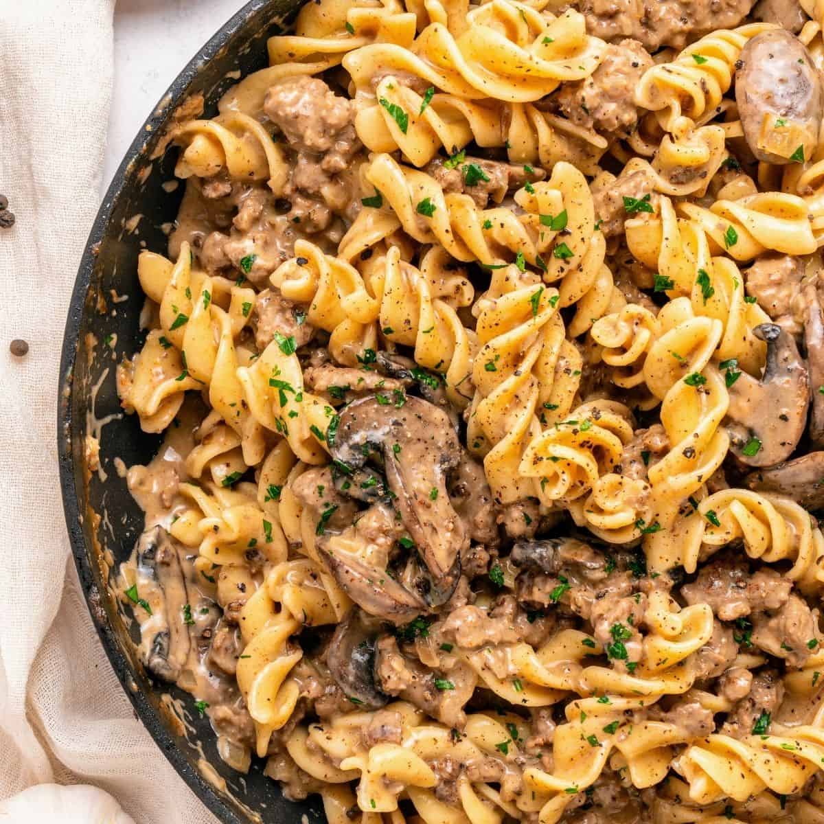 Easy ground beef stroganoff made from scratch with beef, mushrooms, and egg noodles