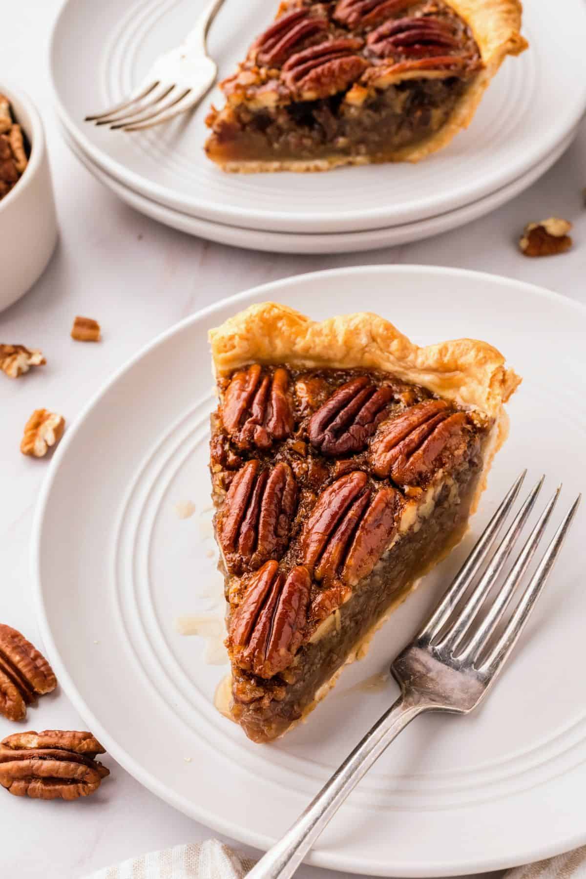 Pecan pie with a gooey browned butter filling and a golden topping of crunchy toasted pecans