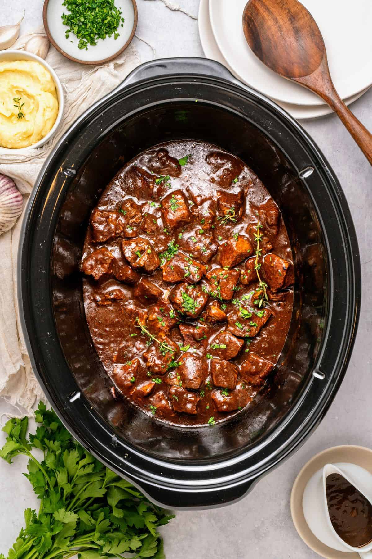 Slow cooked beef tips and gravy with tender beef pieces coated in a thick, flavorful sauce