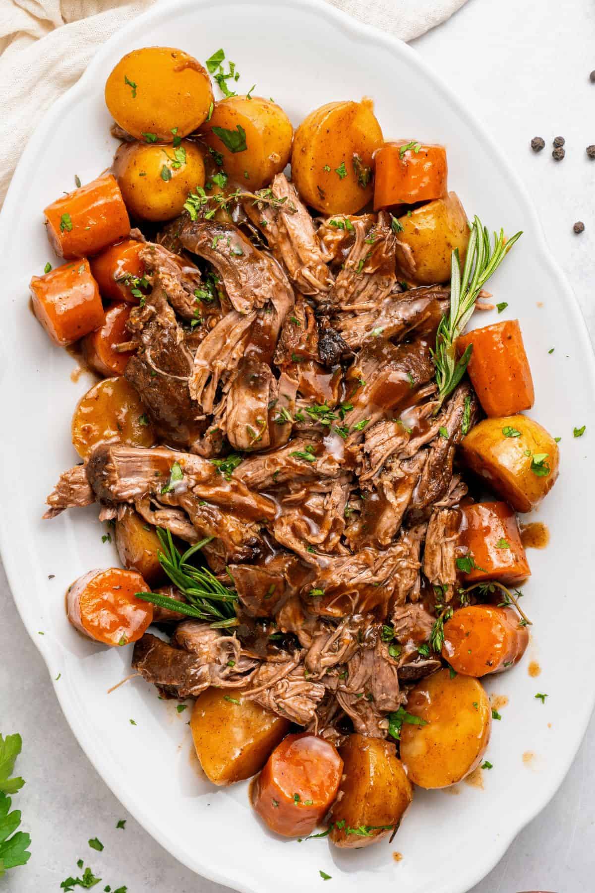 Make pot roast in slow cooker for a hearty meal of tender beef, soft vegetables, and homemade gravy